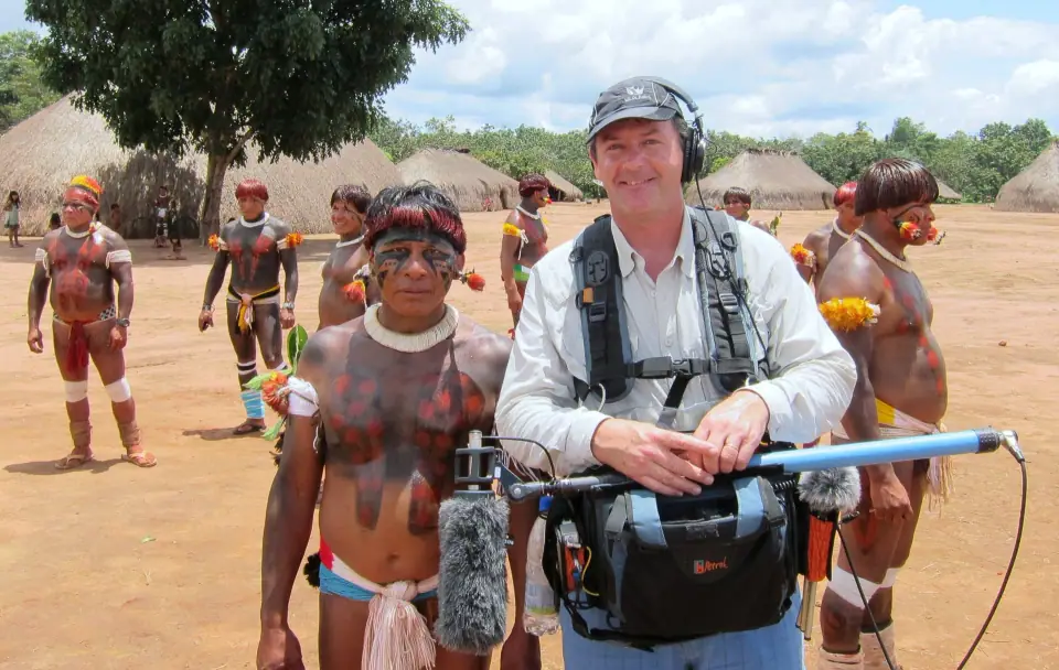 Sebastian standing with a member of the Wauja community in the Amazon